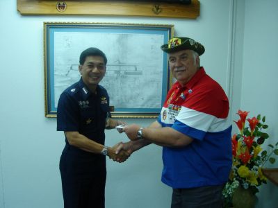 2005 Bankok
Larry presenting the Wing 1 Commander with a CD of significant historical photographs.
