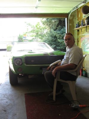 Buffin' a car and smokin' a cigar in July, 2006
